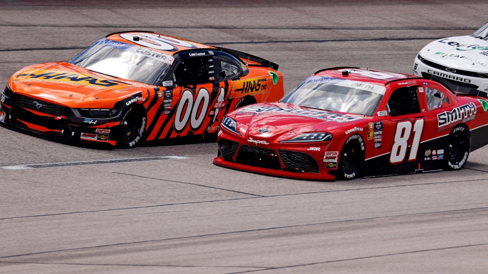 Denny Hamlin reacts to Cole Custer confronting Chandler Smith after Xfinity race at Kansas