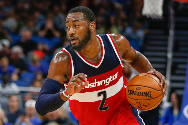 Magic overcome Wall's 52 points, beat Wizards 124-116